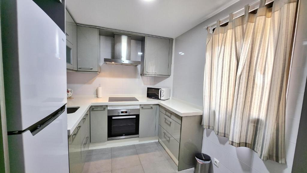 Kuchyň nebo kuchyňský kout v ubytování Apartamento SWEET HOME TOLEDO
