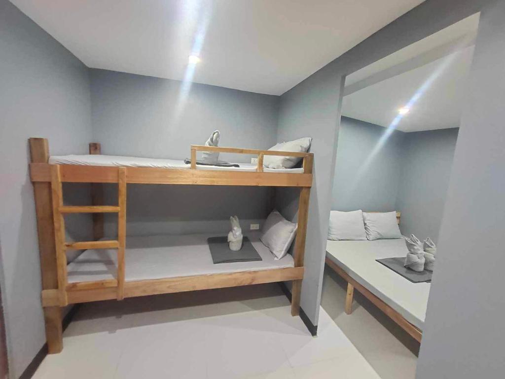 Postel nebo postele na pokoji v ubytování Mantilla Hostel