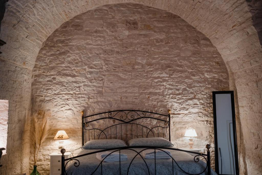 Ліжко або ліжка в номері DOMUS Casa Vacanze