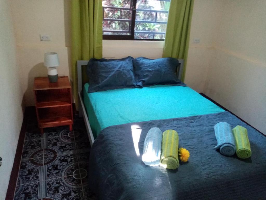 Postel nebo postele na pokoji v ubytování La Casita