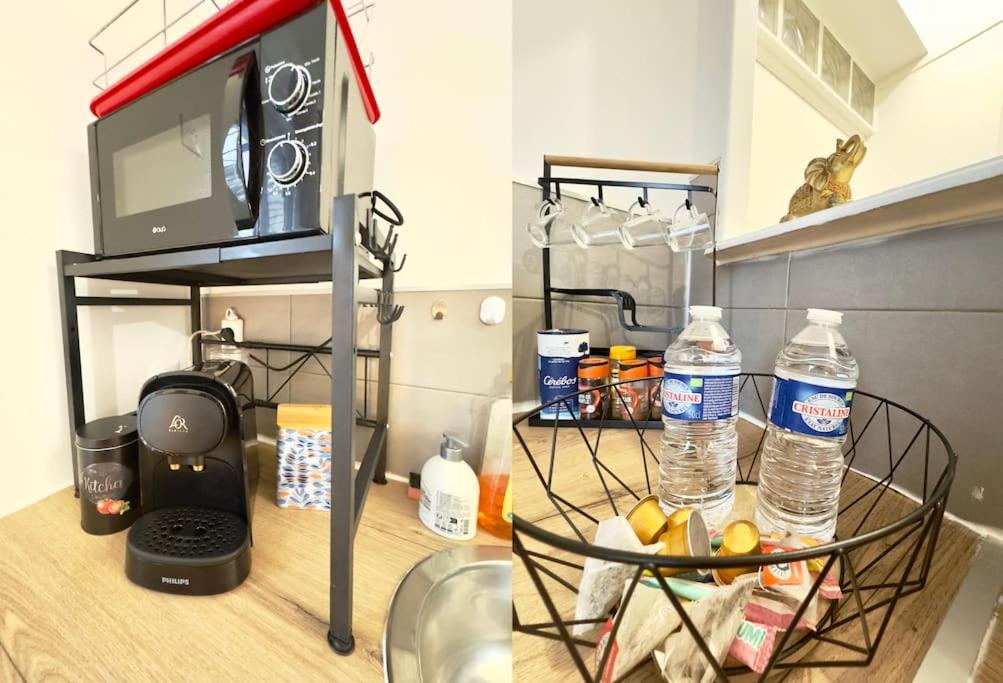 a kitchen counter with bottles of water in a basket at AuKabest 3 * Proche ferry * Gare in Calais