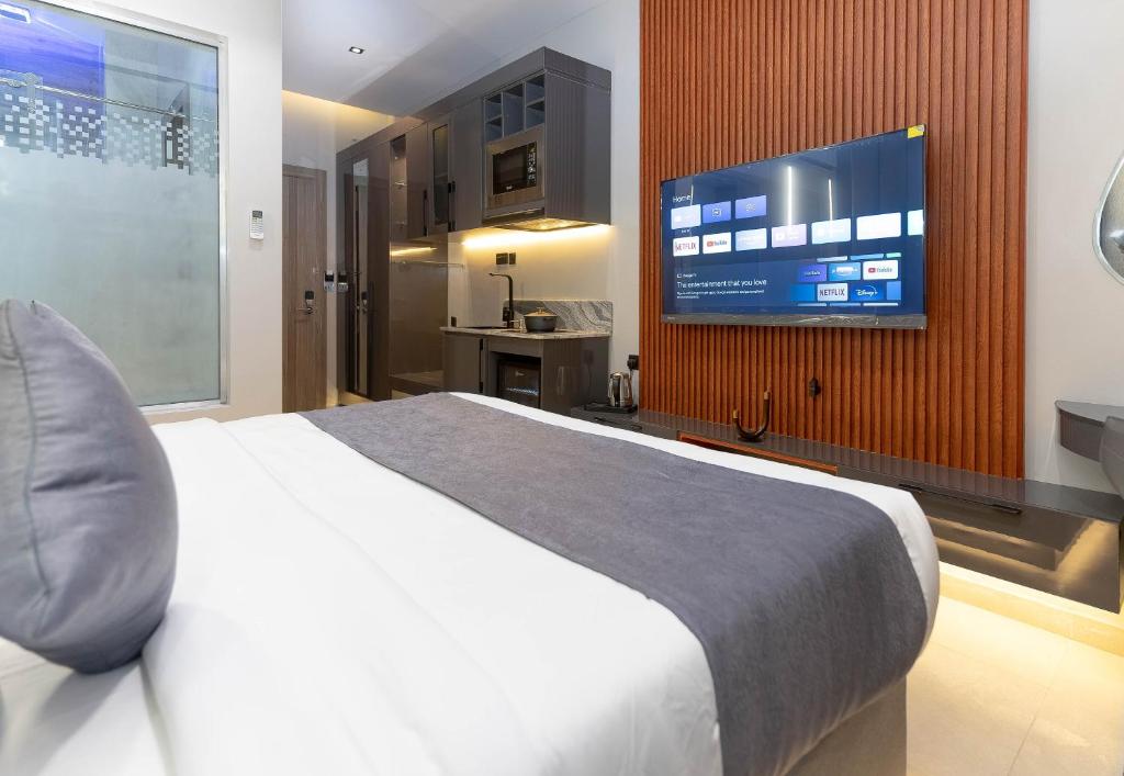 TV a/nebo společenská místnost v ubytování GTA HOTEL IKEJA