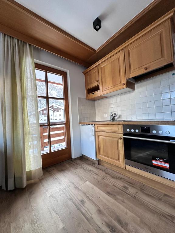 Kuchyň nebo kuchyňský kout v ubytování Apartment Steinbock