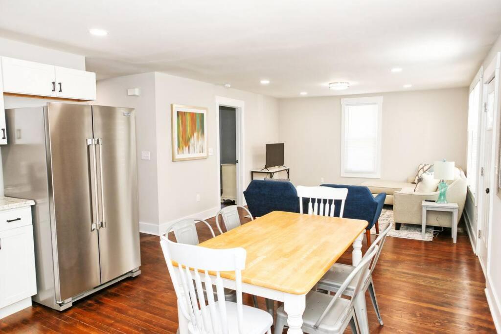 a kitchen and dining room with a table and chairs at Sunny Hill Cottage with 4 Beds in Lincolnton