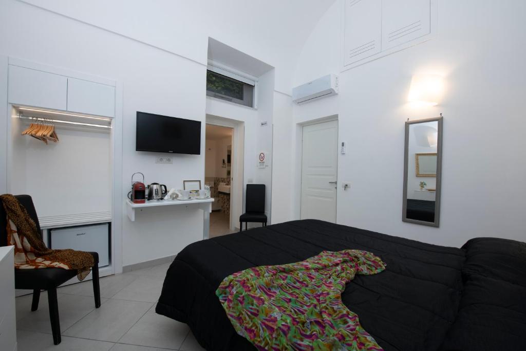 Telewizja i/lub zestaw kina domowego w obiekcie Amalfi Casa Angelina