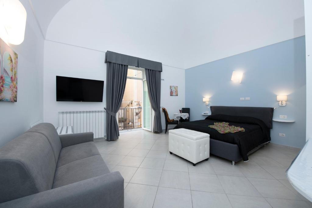 Telewizja i/lub zestaw kina domowego w obiekcie Amalfi Casa Angelina