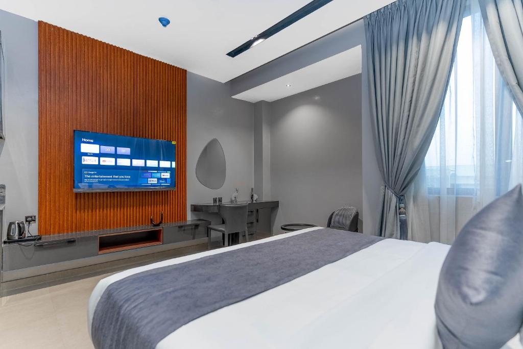 TV a/nebo společenská místnost v ubytování GTA HOTEL IKEJA