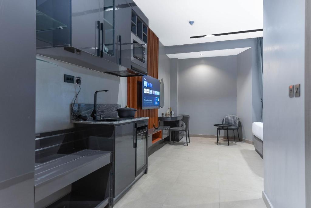 Kuchyň nebo kuchyňský kout v ubytování GTA HOTEL IKEJA