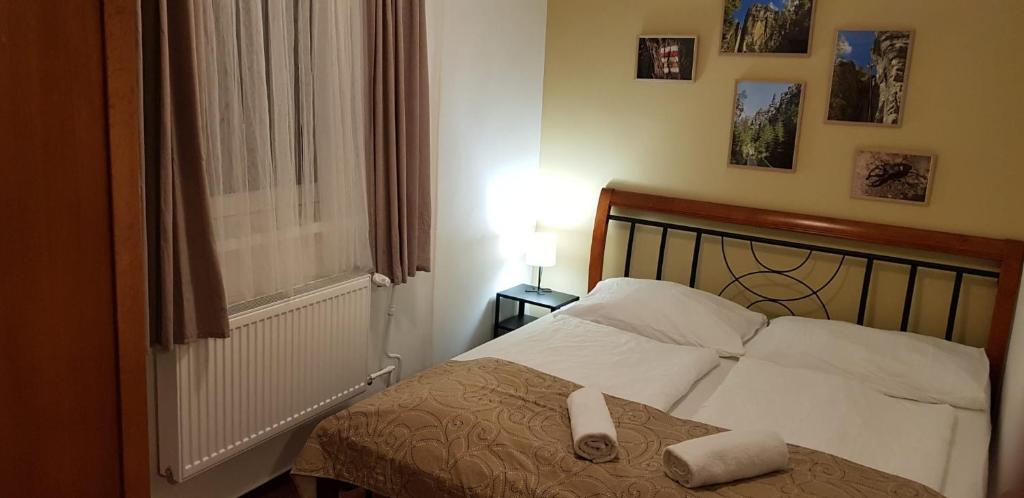 Postel nebo postele na pokoji v ubytování Hotel a restaurace Pomezí