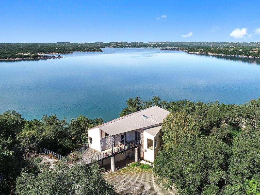 an aerial view of a house on a lake at Overlook Landing in Buffalo Gap