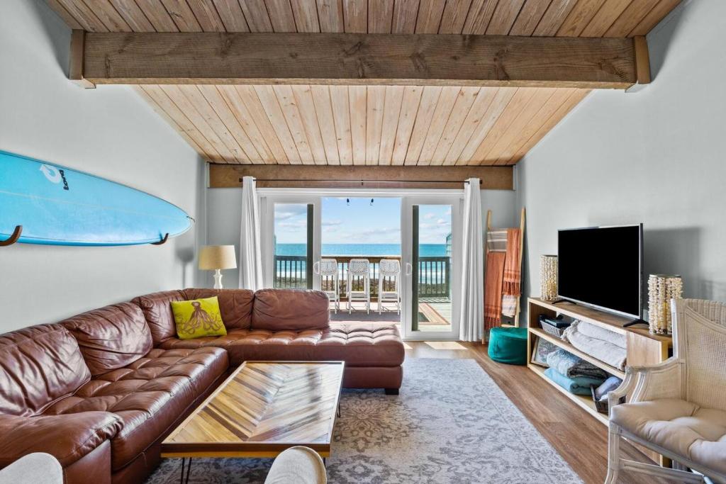 TV a/nebo společenská místnost v ubytování Coral Shores #4 condo