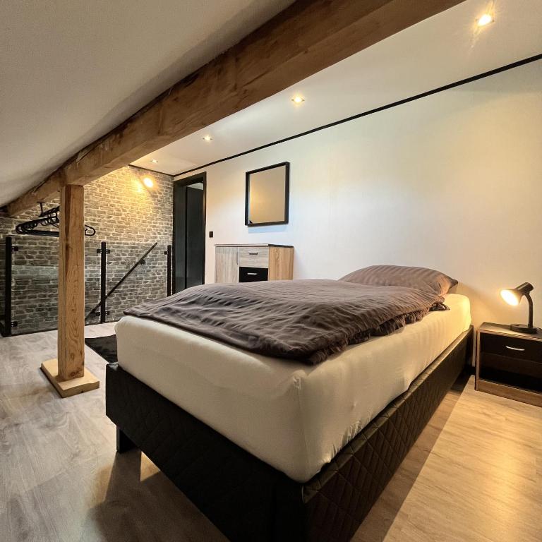 Postel nebo postele na pokoji v ubytování Le Ravel Maison