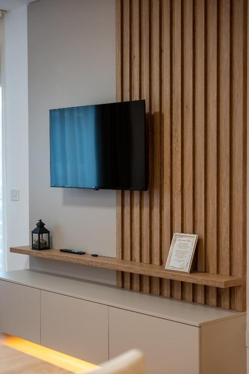 TV a/nebo společenská místnost v ubytování Apartmani MIVA