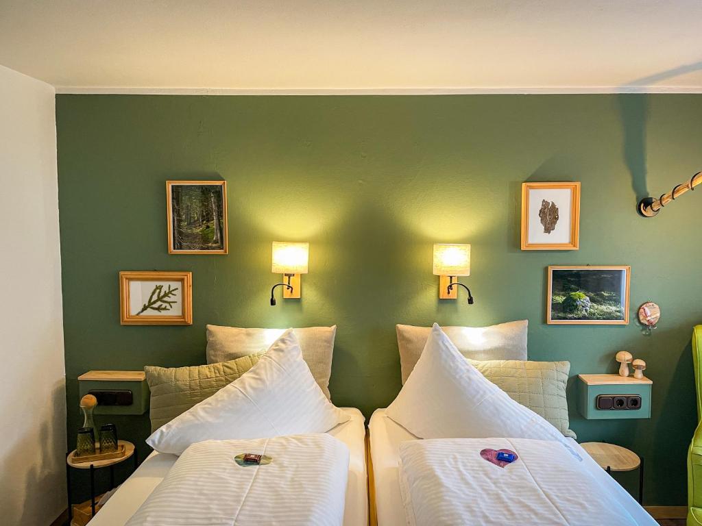 Postel nebo postele na pokoji v ubytování Hotel Tenne