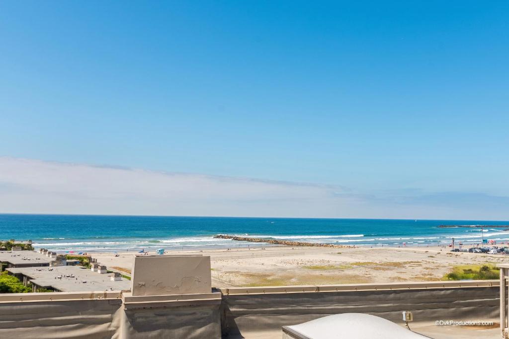 a view of a beach and the ocean at G-314 Surf View Penthouse in Oceanside