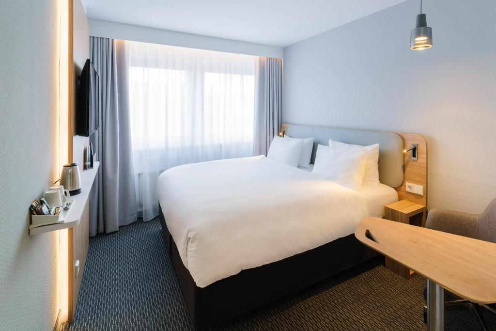 Postel nebo postele na pokoji v ubytování Holiday Inn Express Dresden Zentrum by IHG