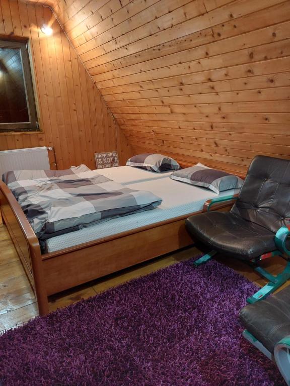 Giường trong phòng chung tại Kuća Milica