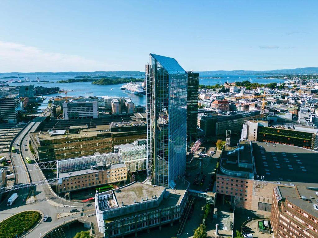 an aerial view of a city with a tall skyscraper at Radisson Blu Plaza Hotel, Oslo in Oslo