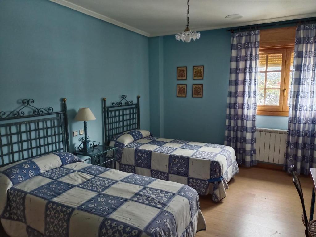 Postel nebo postele na pokoji v ubytování Hotel Pico Espiguete