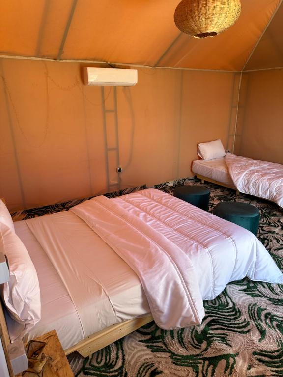 Postel nebo postele na pokoji v ubytování AGAFAY HEART CAMP