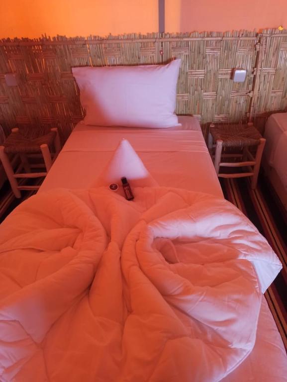 Postel nebo postele na pokoji v ubytování AGAFAY HEART CAMP