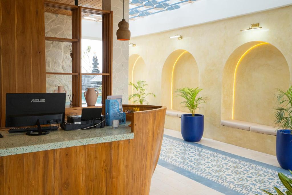 TV a/nebo společenská místnost v ubytování Alana Penida Hotel