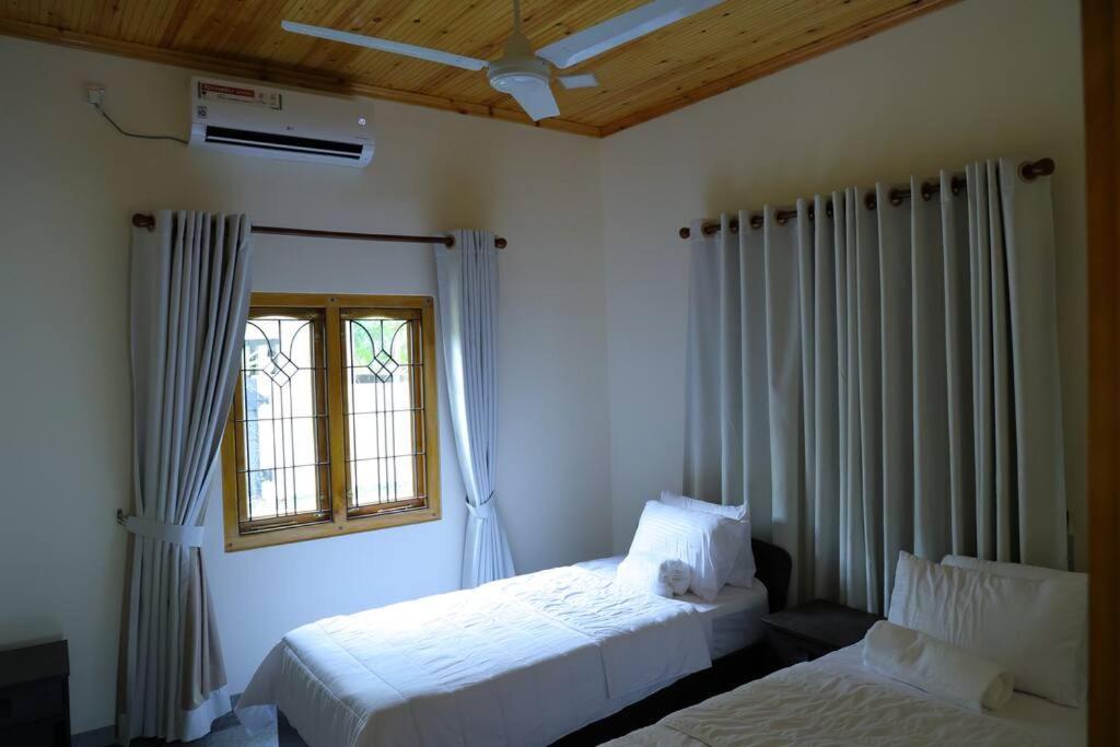 Postel nebo postele na pokoji v ubytování Lone Star Residence