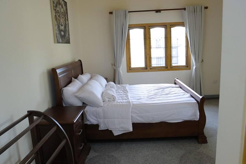 Postel nebo postele na pokoji v ubytování Lone Star Residence