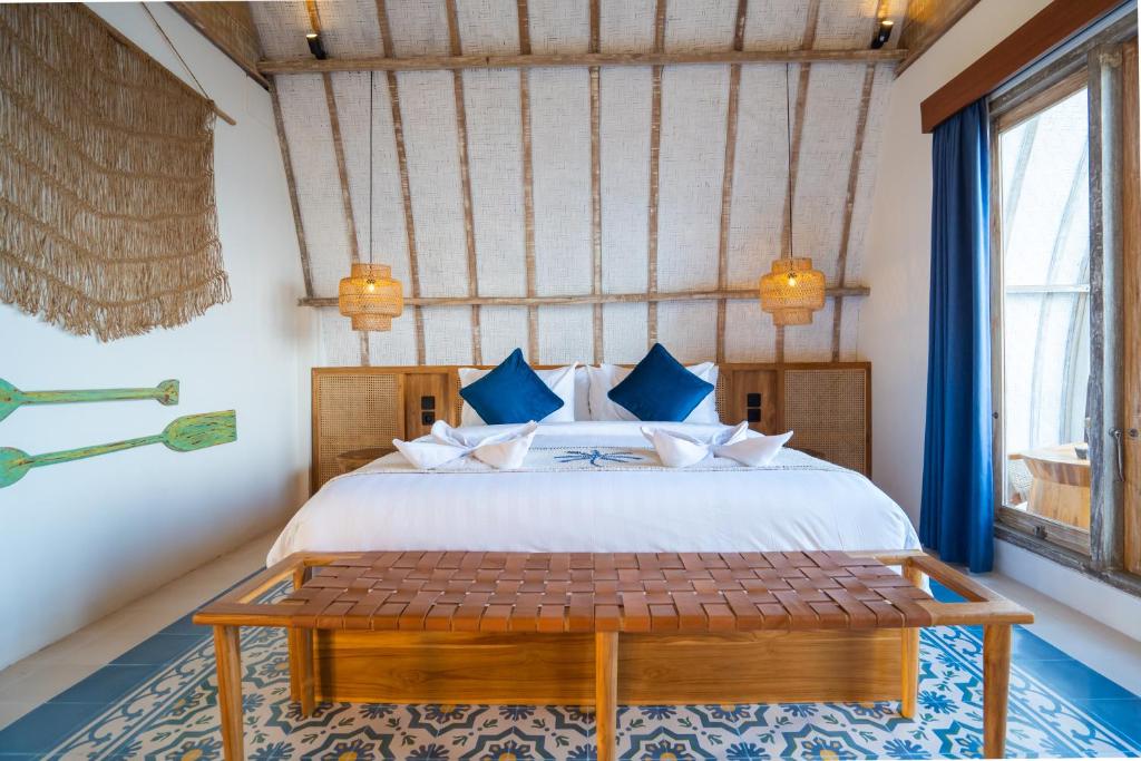 Postel nebo postele na pokoji v ubytování Alana Penida Hotel
