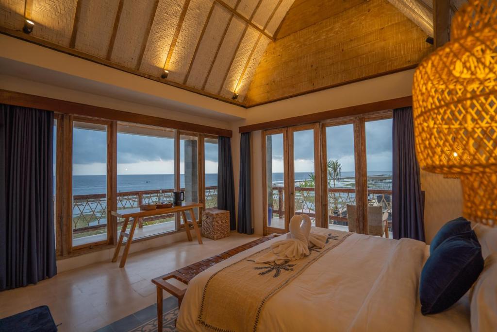 Postel nebo postele na pokoji v ubytování Alana Penida Hotel