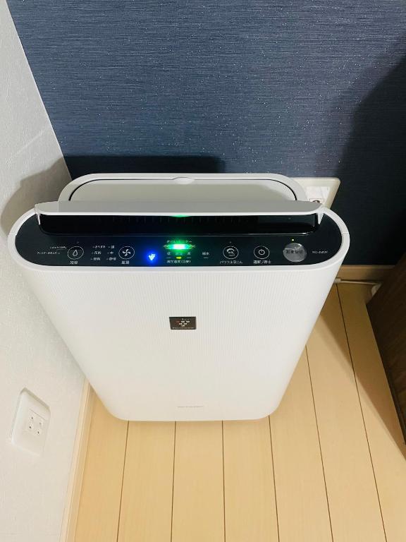 大阪市にある無料駐車場 3階建て一軒家 最大10人 3寝室 2トイレ ペットOK家族団体向き Usj 道頓堀 難波近いのギャラリーの写真
