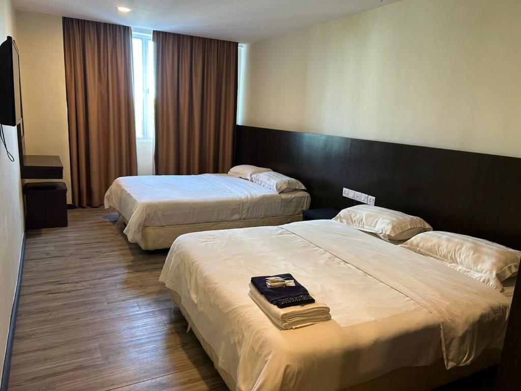 Postel nebo postele na pokoji v ubytování LUCKY - 5 INN