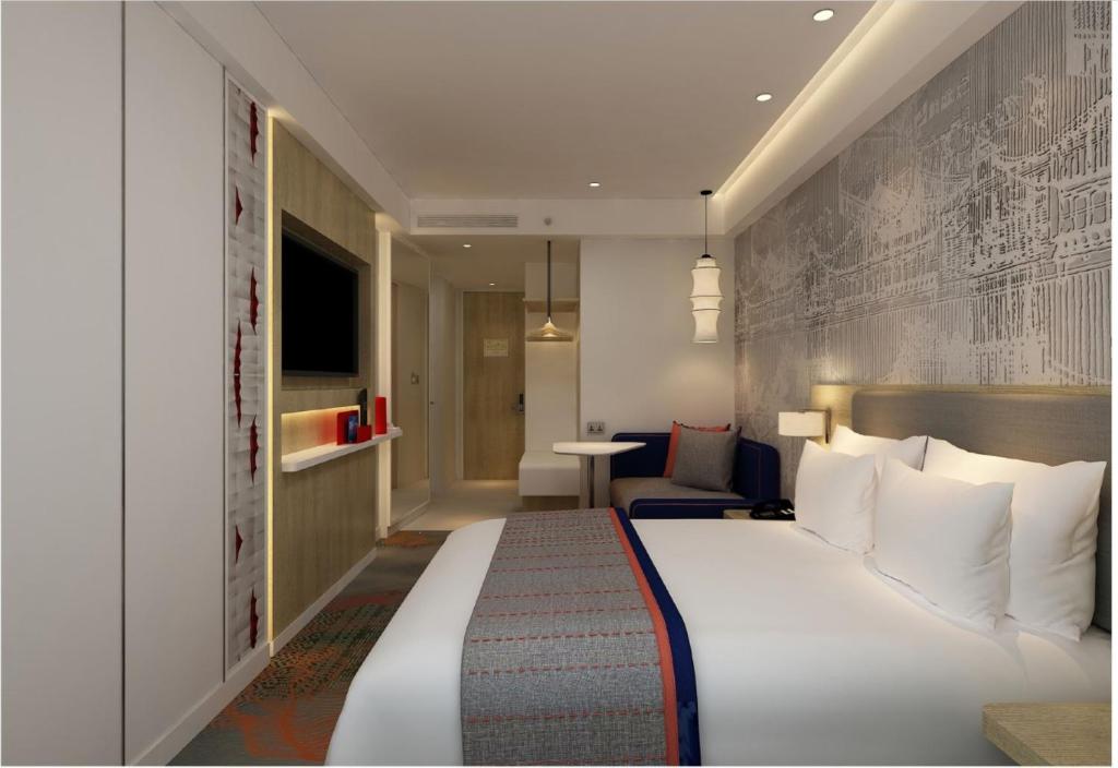 Postel nebo postele na pokoji v ubytování Holiday Inn Express Kathmandu Naxal by IHG