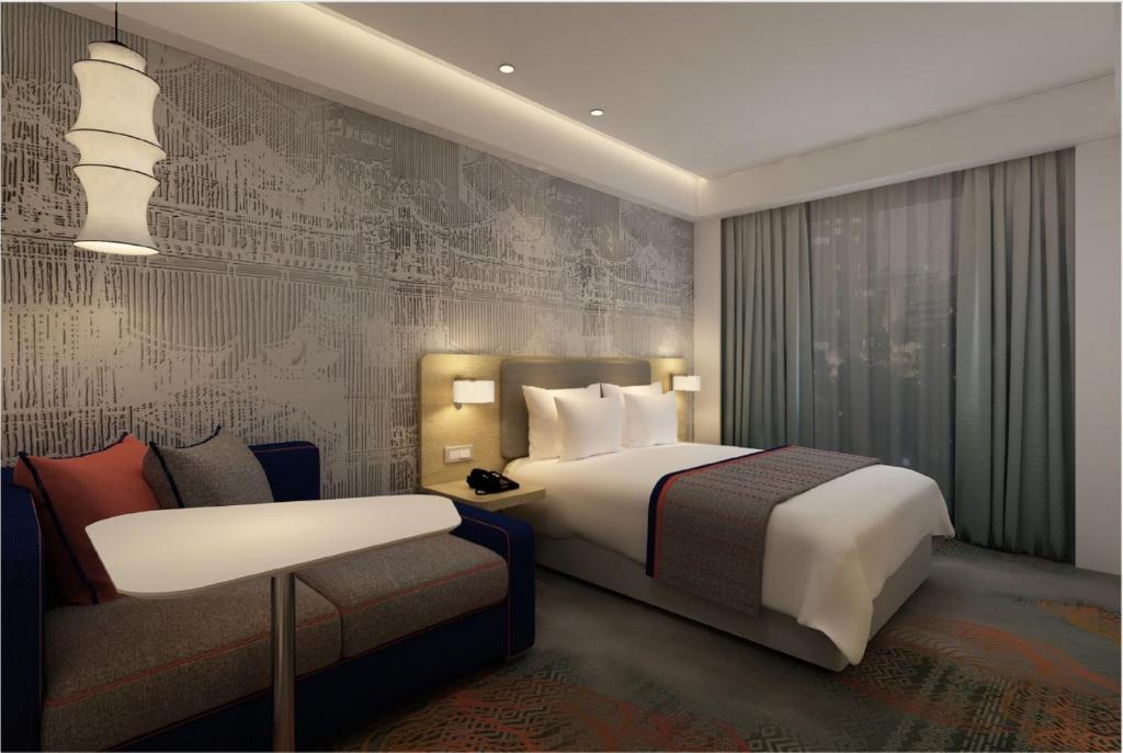 Postel nebo postele na pokoji v ubytování Holiday Inn Express Kathmandu Naxal by IHG