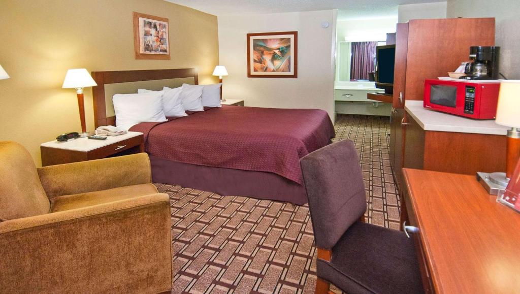 Postel nebo postele na pokoji v ubytování Hotel Francis