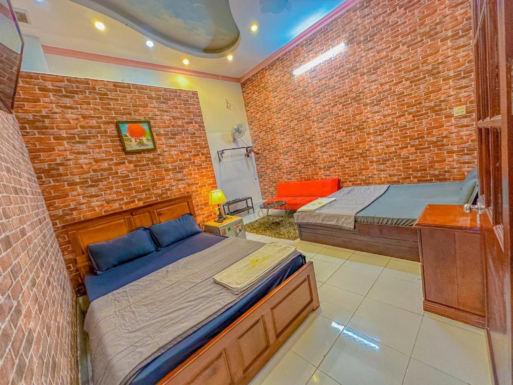 Posezení v ubytování Hoàng Sơn's Home