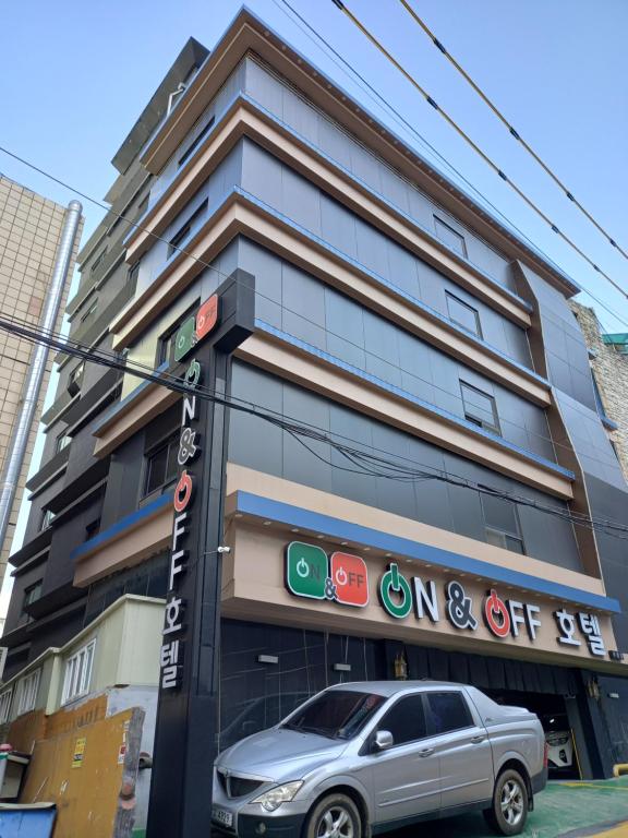 a car parked in front of a building at On & Off Hotel Bupyeong in Incheon