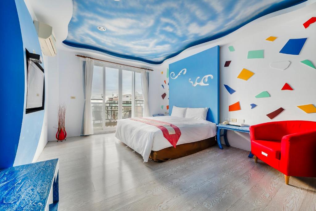 Postel nebo postele na pokoji v ubytování Wei Yuan Hotel
