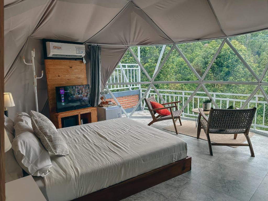 Voodi või voodid majutusasutuse Moondock Luxury Camp toas