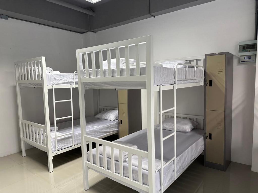 Postel nebo postele na pokoji v ubytování PJ Hostel
