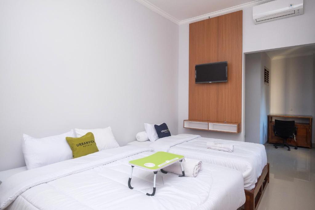 Urbanview Syariah Loji Arum Stasiun Klaten by RedDoorz - Habitación Familiar
