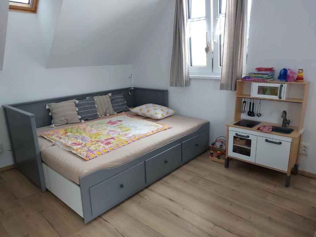 Postel nebo postele na pokoji v ubytování Apartmány Ema a Ela