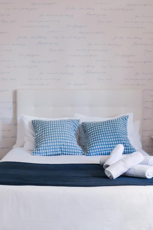 Posteľ alebo postele v izbe v ubytovaní Larios Premium Apartments