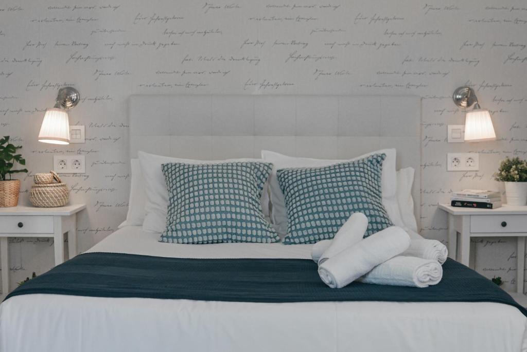 Posteľ alebo postele v izbe v ubytovaní Larios Premium Apartments