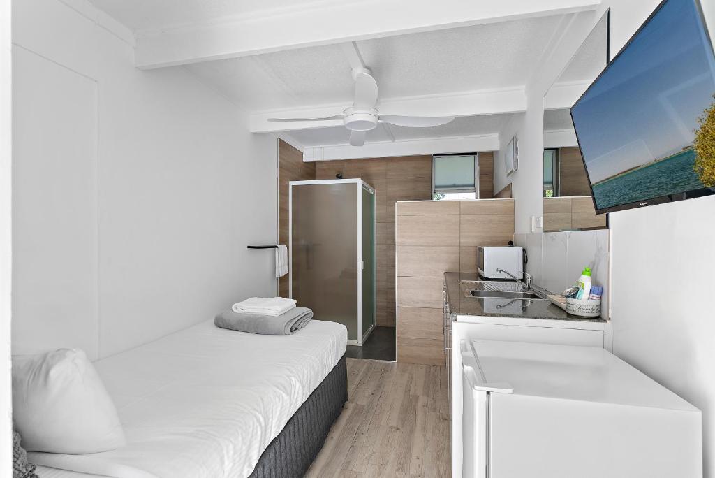 Postel nebo postele na pokoji v ubytování Buderim Fiesta Motel