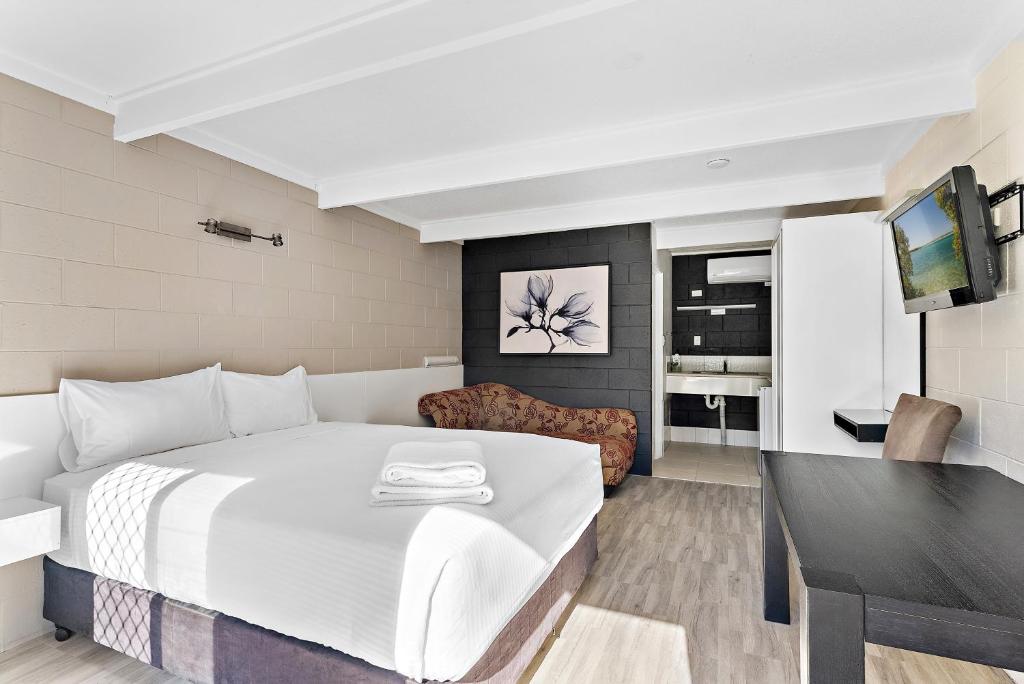 Postel nebo postele na pokoji v ubytování Buderim Fiesta Motel