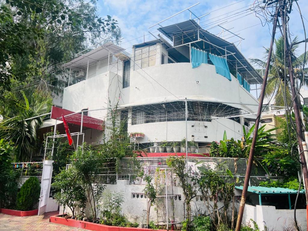 a building with scaffolding on the side of it at Cozy 1 BHK Apartment in Nagpur