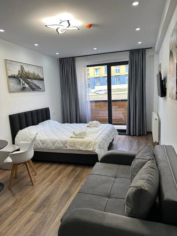 Postel nebo postele na pokoji v ubytování Snow Twin Flats Gudauri