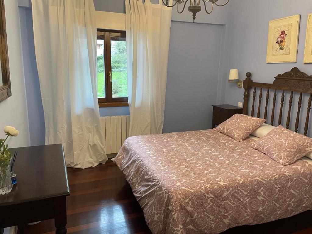 Postel nebo postele na pokoji v ubytování Hotel Kaia