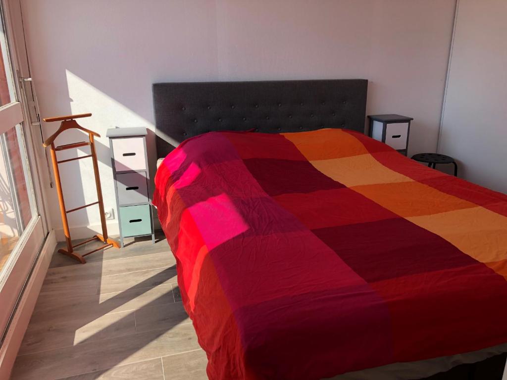 Katil atau katil-katil dalam bilik di Appartement - Saint-Philibert - Men Er Beleg